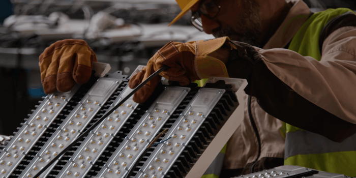 Hands assembling mechanical parts in Mexico